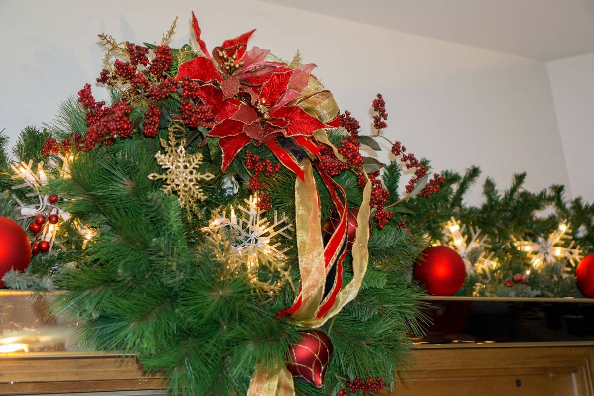 Close-up of durable wreaths with flowers and deco mesh showing wired stem attachment